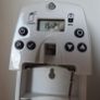 Black digital automatic air freshener dispenser. Image 3