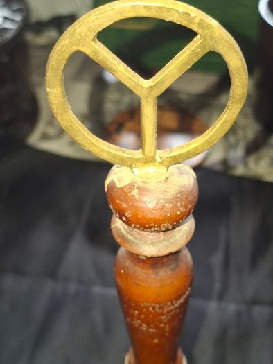 Vintage Brass School Bell with a turned wooden handle and a ring shaped top
