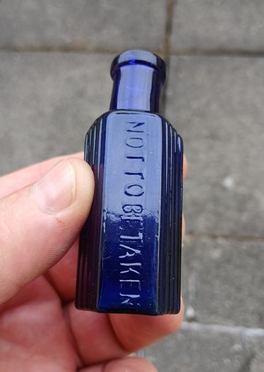 Rare Not To Be Taken 1/2oz blue glass bottle