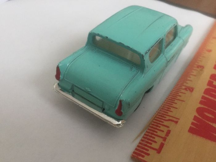 Spot-on. Tri-ang. Ford Anglia. Model number 213. Featured in Harry Potter movie.