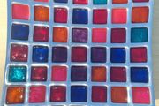 A colorful mosaic tray made of aluminum and enamel by Azeti