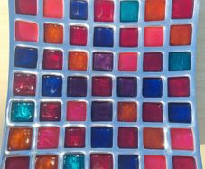 A colorful mosaic tray made of aluminum and enamel by Azeti