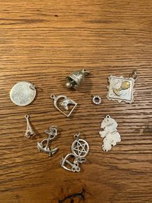 Joblot of vintage sterling silver charms