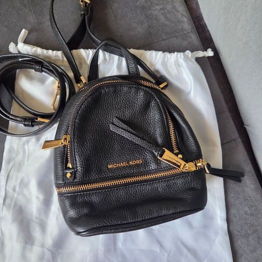 Genuine Michael Kors black mini backpack convertible crossbody in excellent condition