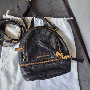 Genuine Michael Kors black mini backpack convertible crossbody in excellent condition