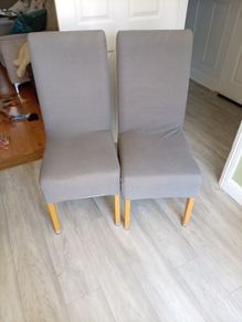 2 cream kitchen chairs with covers