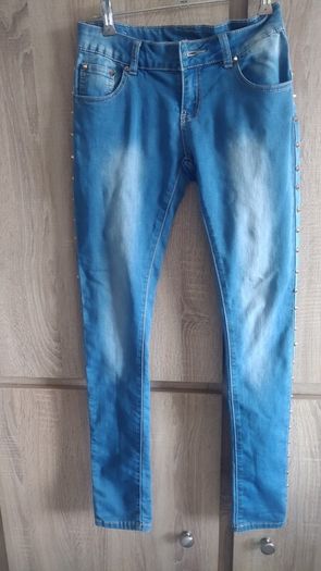New koucla jeans with studs size small