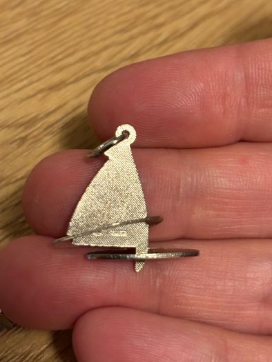 A Pair of Vintage Silver Boat Pendants