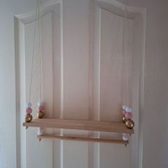 Two lovely hanging shelves for girls room