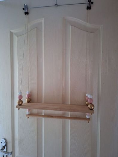 Two lovely hanging shelves for girls room