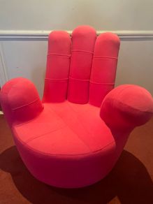 Pink hand shaped chair