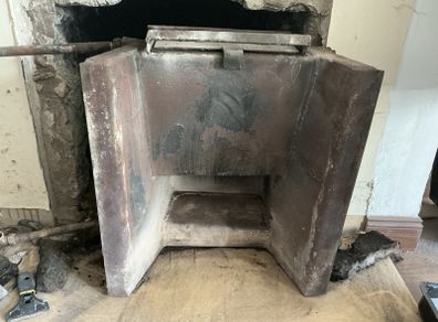 Back Boiler ( Old School ) Cast Iron, Heats up to 10 Rads when fire is lighting