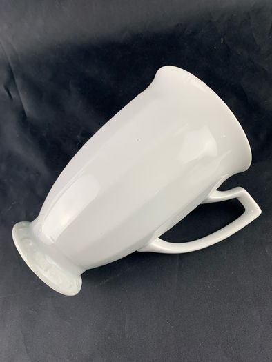 A classic mocha/coffee mug and saucer by Rosentha