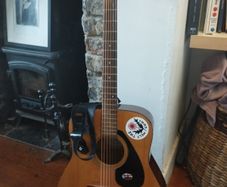 Yamaha acoustic with strap