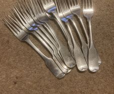 12 silver heavy forks made in Ireland around 1825 by well known Irish silversmiths.