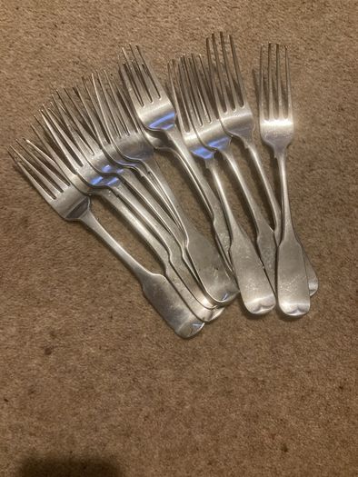 12 silver heavy forks made in Ireland around 1825 by well known Irish silversmiths.