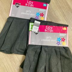 School skirt x2 (4/5 and 6/7 y)