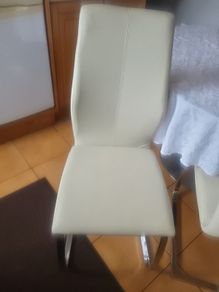 cream leather chairs