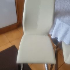 cream leather chairs