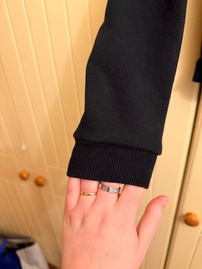 Black whistles sweatshirt