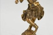 Heavy brass Deity with flute statue