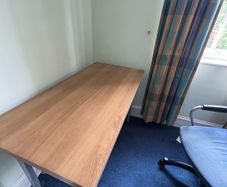 Desk with adjustable legs