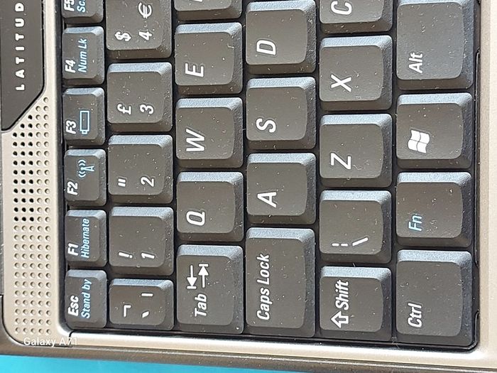 DELL LATITUDE D410, (Vintage), .5GB Ram, 40GB HDD, Original Windows XP, Excellent Battery and in super cosmetic condition,