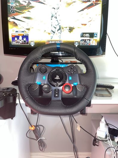 Logitech G29 steering wheel, pedals and shifter.
