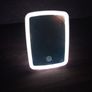 Compact LED Makeup Mirror with Touch Sensing, Featuring Three Lighting Options Image 2