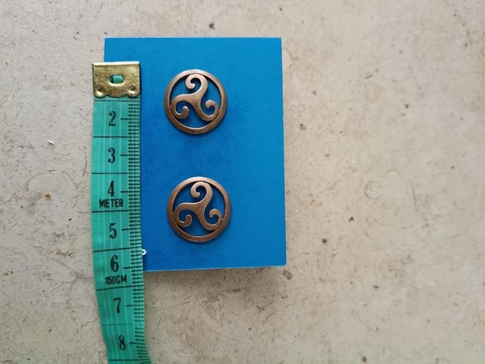 Ear rings Triskele meaning balance body soul mind new and never used and in excellent condition with FREE STANDARD POSTAGE INCLUDED
