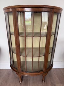 Bow fronted display cabinet