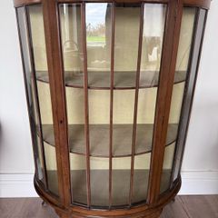Bow fronted display cabinet