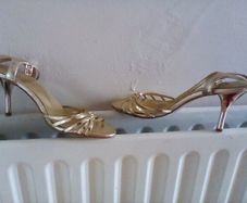 Gold strappy sandals/ shoes . Ideal for a wedding or night out . Size 6.In box