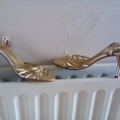 Gold strappy sandals/ shoes . Ideal for a wedding or night out . Size 6.In box