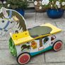 Wooden horse-themed ride-on toy in good used condition Image 3
