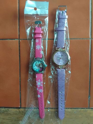 2 womans watches with leather straps
