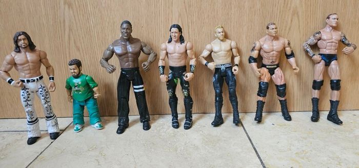 WWE 54 action figures, The 4 wrestlers in the last photo are sold