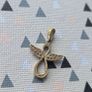 Gold pendant, stamped 375. A few stones are missing, so selling for repair. Please see photos for condition. Image 3