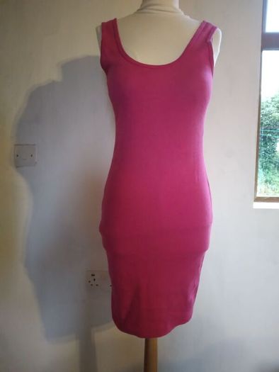 Stretch Dress,figure hugging.Size 12 Brand New.