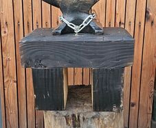 anvil on timber stand