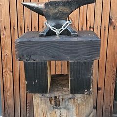 anvil on timber stand