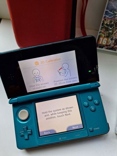 Aqua Blue Nintendo 3DS with games