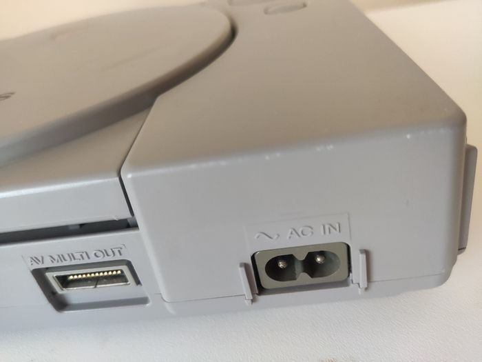 Playstation 1 console SCPH-7502 with games and cords
