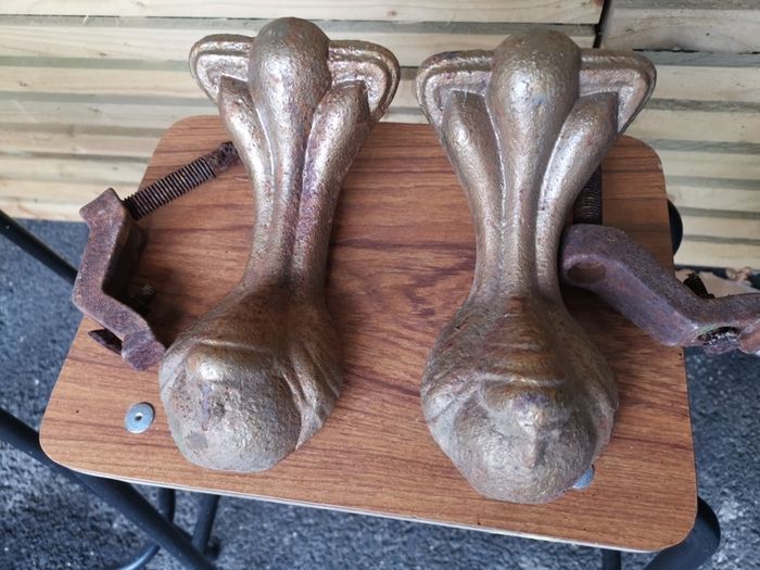 A pair of orignal cast iron bath tub claws