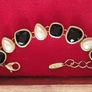 A beautiful gold-tone bracelet. Image 6