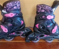 Black and pink roller blades