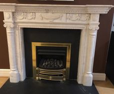Marble Fireplace and Black Granite Hearth