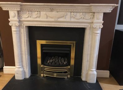 Marble Fireplace and Black Granite Hearth