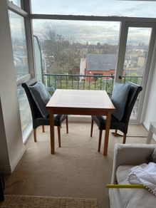 Extendable dining table and four chairs