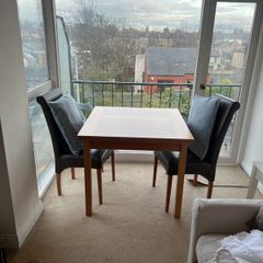 Extendable dining table and four chairs